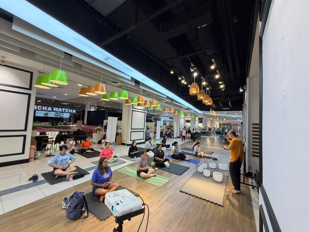 A breathwork session set up in an open public space at Jaya One